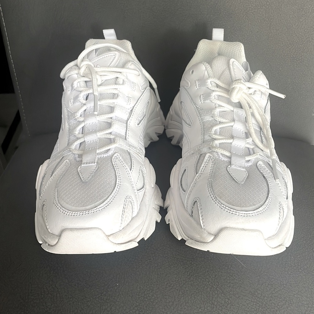 All white Fila electrove
